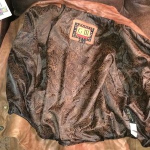 Women’s brown leather jacket. Never worn. Large